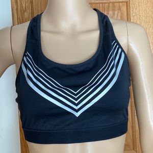 Champion- black medium support sports bra with racerback and partial tags